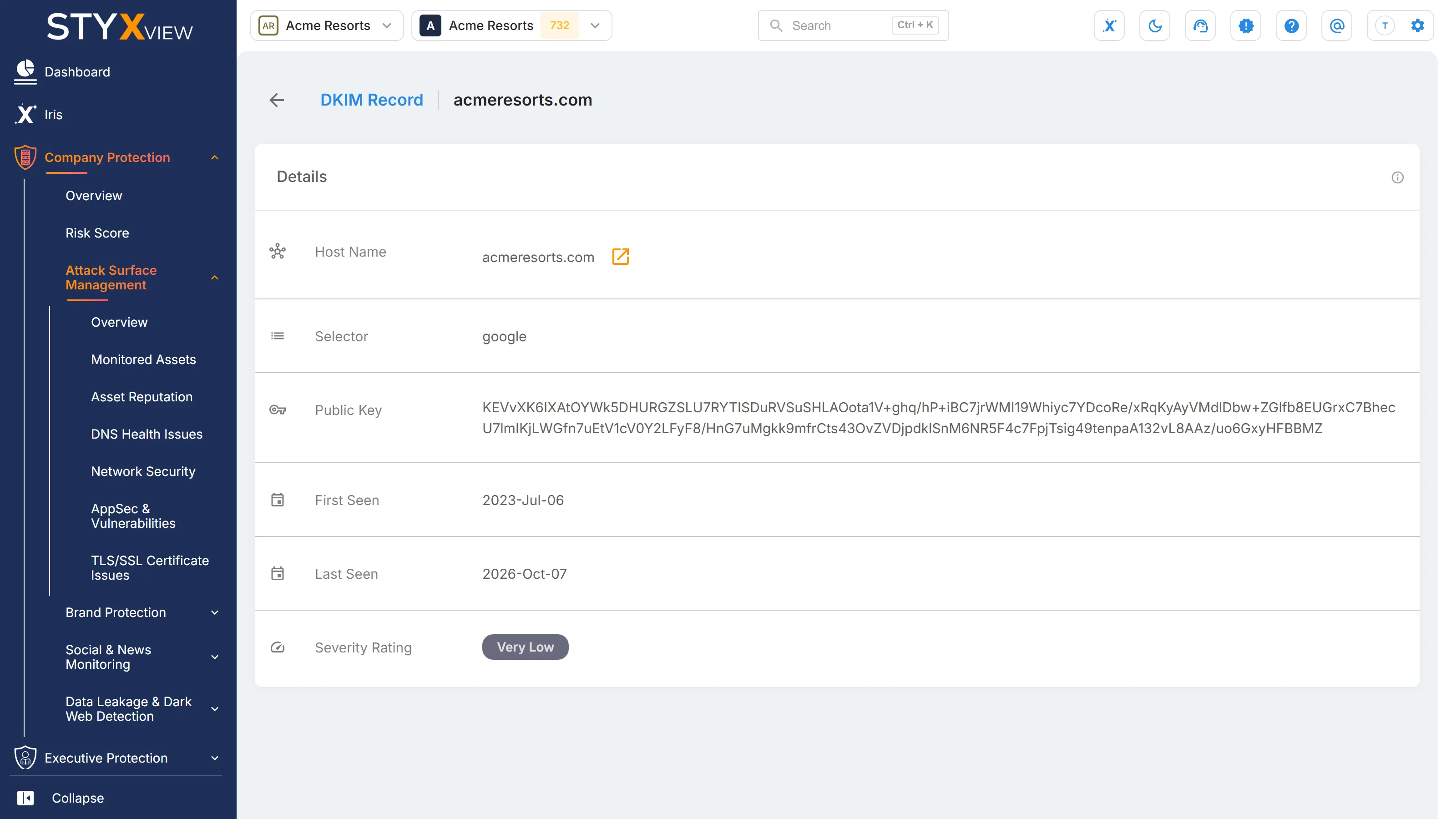 A DKIM record's detail page, with the domain, selector, full public key, severity rating, and first and last seen dates.